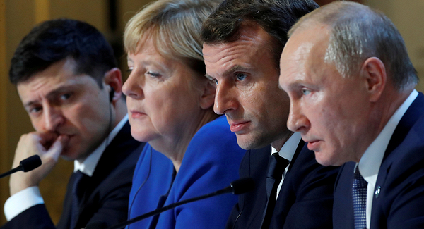 Меркель назвала Путина победителем на саммите в Париже

