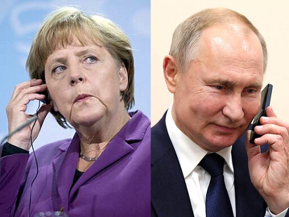 Путин и Меркель провели телефонные переговоры
