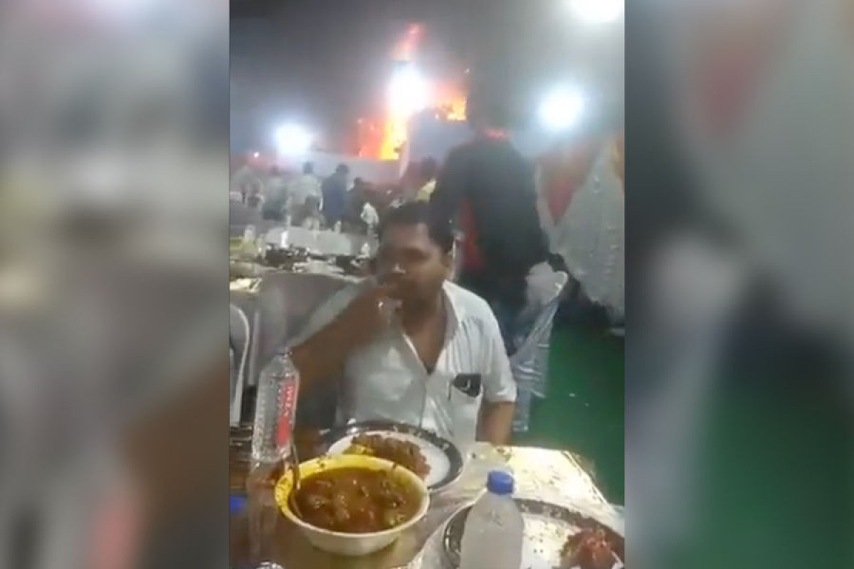 Видео с гостем свадьбы, продолжавшим есть во время пожара, развеселило соцсети-ВИДЕО 