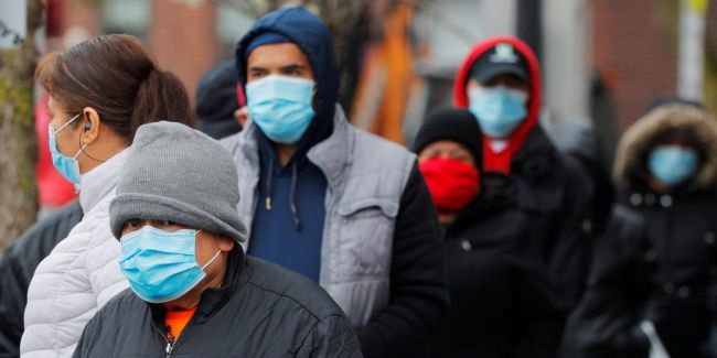 Ежесуточное число заражений COVID-19 в США возросло до 57 тысяч
