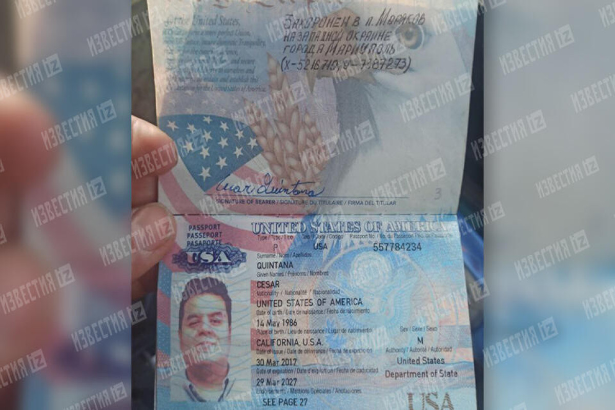 Российский военный показал паспорт ликвидированного наемника из США-ВИДЕО