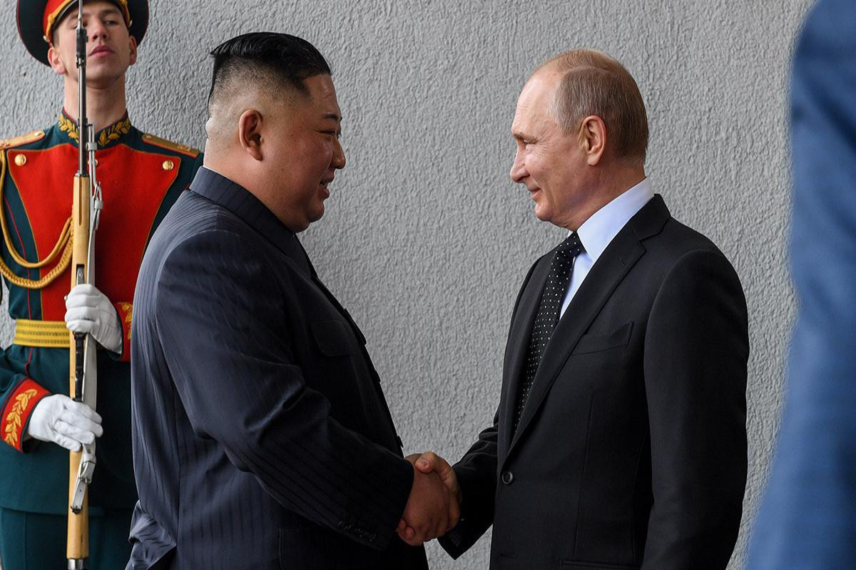 Президент России Владимир Путин и лидер КНДР Ким Чен Ын