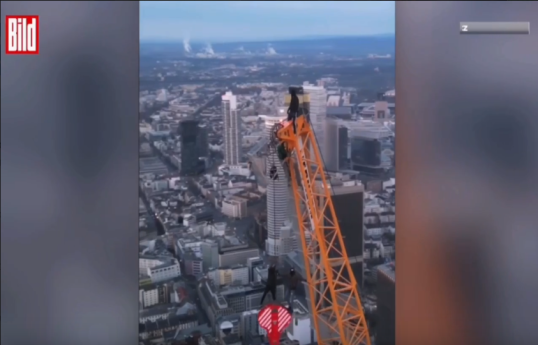 Руферы из Польши поднялись на самый высокий кран в Европе-ВИДЕО 