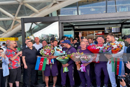 Олимпийские чемпионы вернулись в Баку-ФОТО 