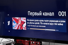 Платные телеканалы в День победы транслировали в РФ кадры "Русского марша" и теракт в "Крокусе"